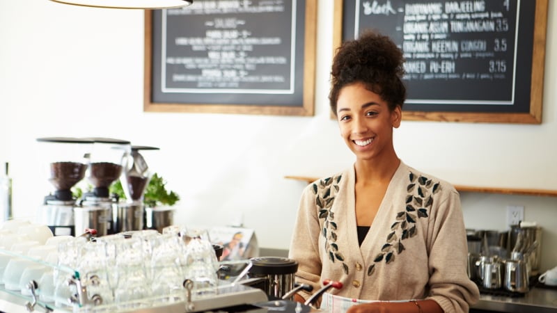 Woman working in a cafe